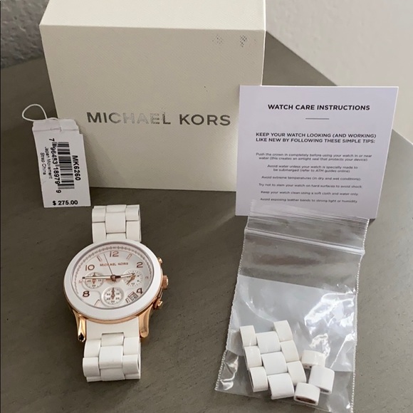 Michael Kors Accessories - Michael Kors silicon strap watch in rose gold.